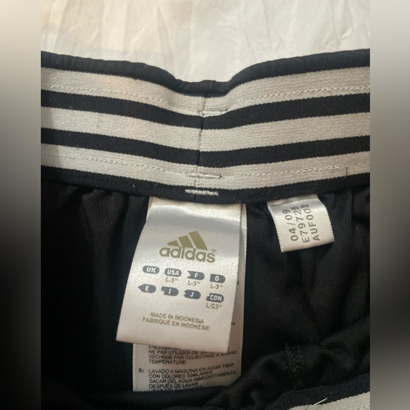 One pair of Adidas, running shorts, large, and one Nike short set, medium - Picture 2 of 9